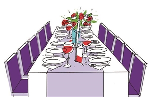 Gedeckte lange Festtafel als Symbol für ein Kochevent