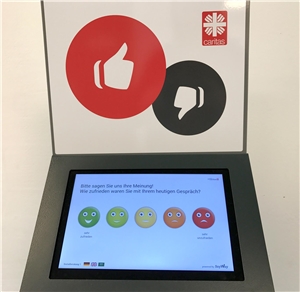 Feedback-Point Monitor Feedback-Point Monitor mit fünf Smileys von sehr zufrieden bis unzufrieden