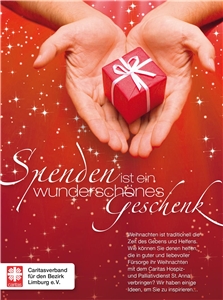 Spendenbild Hospiz Ein Geschenkpäckchen wird von zwei Händen gehalten.