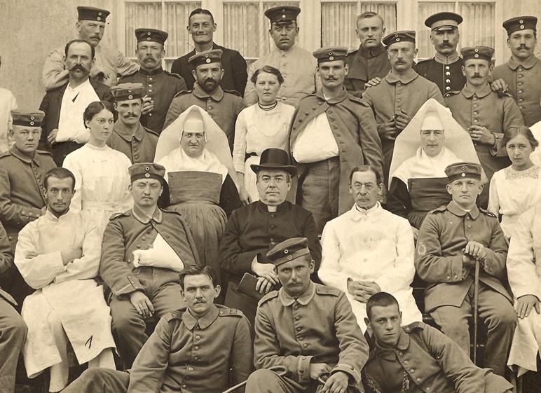 The first Caritas President, Lorenz Werthmann, visiting a military hospital in 1914.