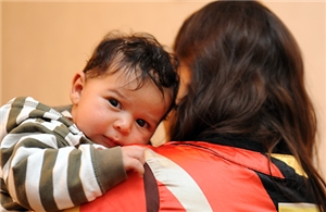 Mutter mit Baby im Arm Mutter mit Baby im Arm
