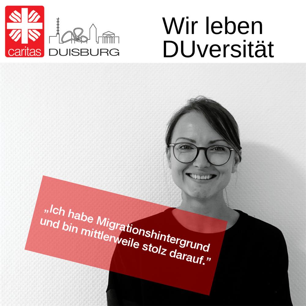 Mitarbeiterin Marthe mit dem Banner-Spruch 