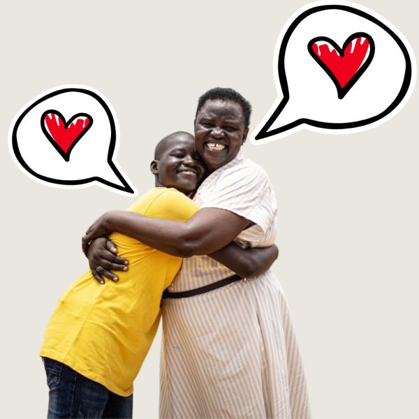 Betty Loro umarmt eines der Kinder aus dem Kinderzentrum
