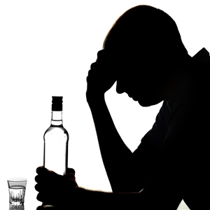 Silhouette eines alkoholkranken Menschen