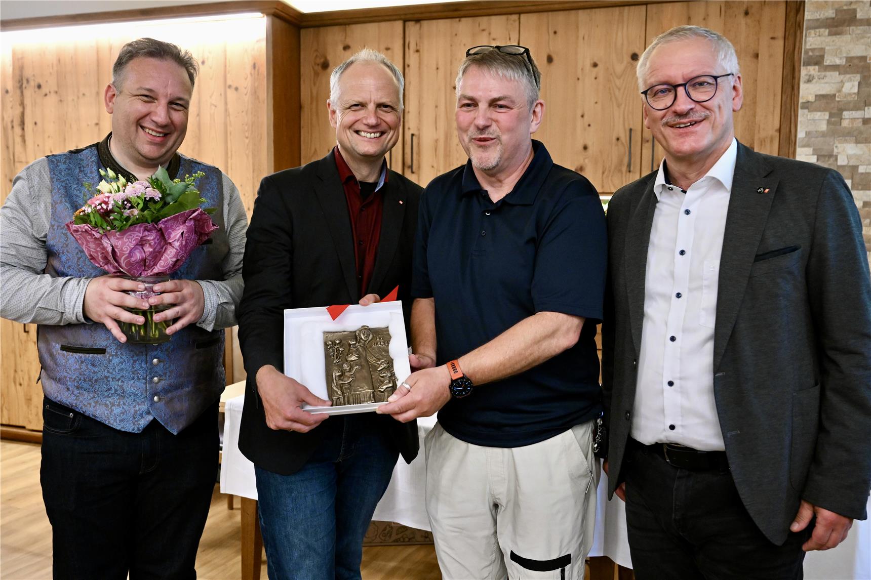 Vier Männer im Gruppenbild