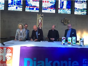 Unterzeichnung der Charta Oecumenica Socialis durch Diakonie und Caritas