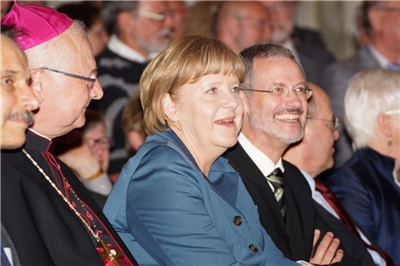 Kanzlerin Merkel und Caritas-Präsident Neher