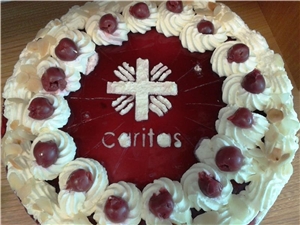 Torte mit Caritas-Logo Torte mit Caritas-Logo
