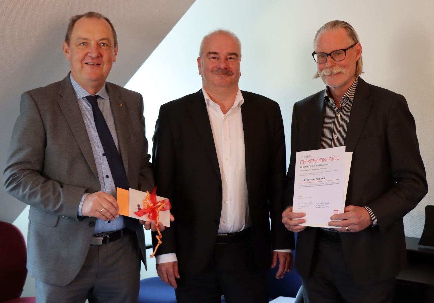 Vorstand Ansgar Erb, Diözesan-Caritasdirektor Dr. Markus Juch und Franz Meyer