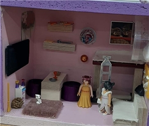 Puppenhaus mit Playmobilfiguren