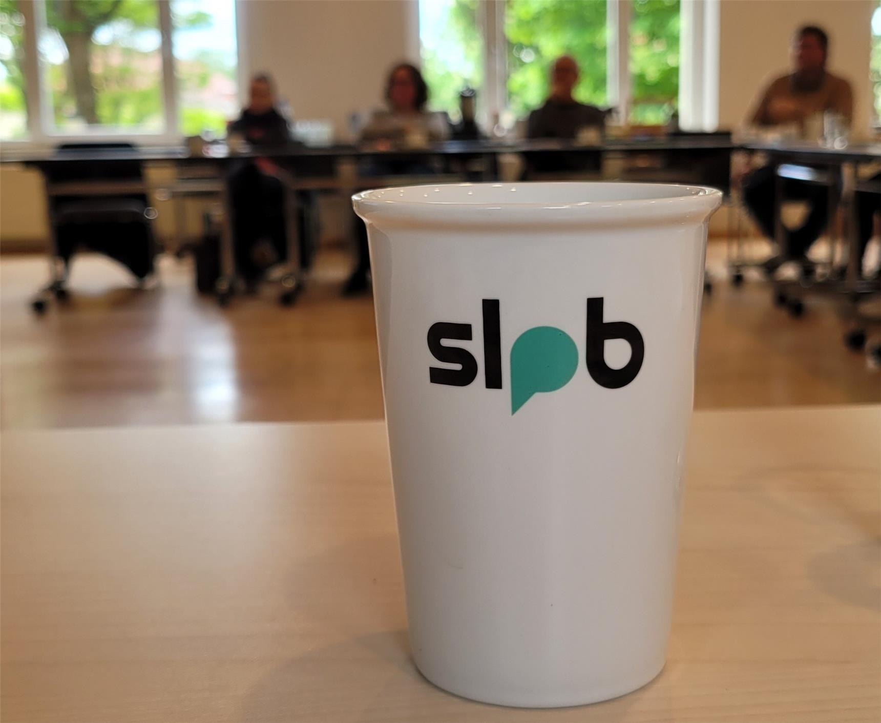 Kaffee-Becher mit SLUB-Logo