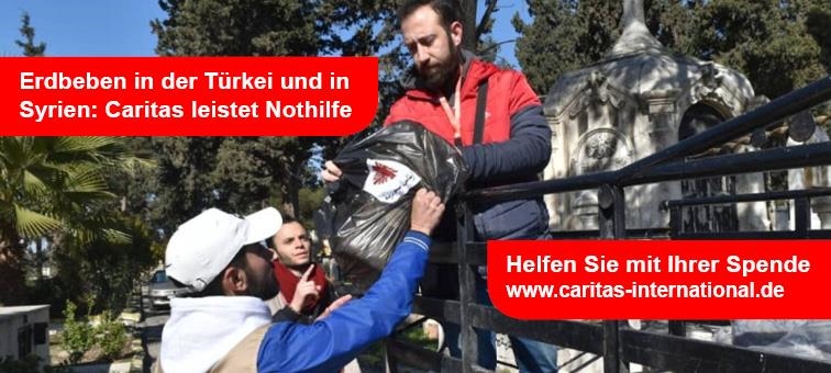 Helfer der Caritas Syrien verteilen Hilfsmittel