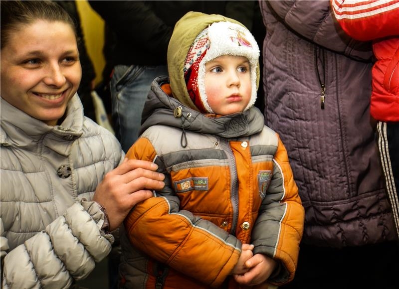 Betreuerin mit Kind (Caritas Spes, Ukraine)