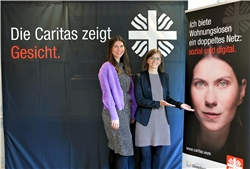 Eugenie Riffel, Vorstand des CV Hochtaunus und Model Ricarda präsentieren das Plakatmotiv zum Start der Kampagne "Die Caritas zeigt Gesicht". / Jochen Reichwein